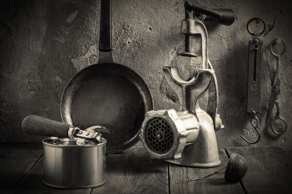 Obsolete kitchenware. Vintage toned photo 