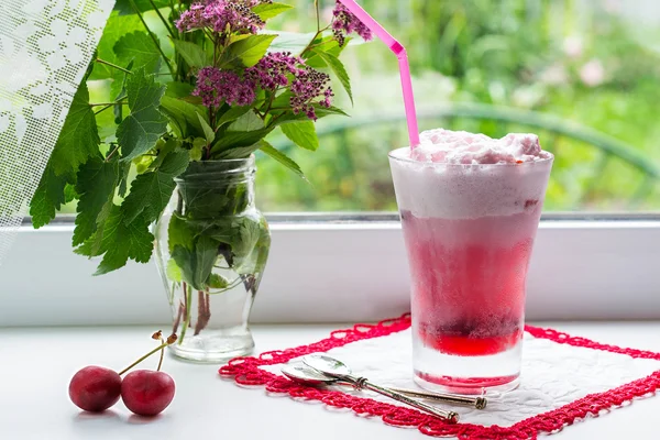 Fresh cold fruit cocktail with ice cream on the window — 스톡 사진
