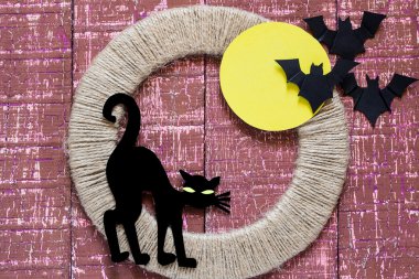 Halloween characters: Black cat and bats 