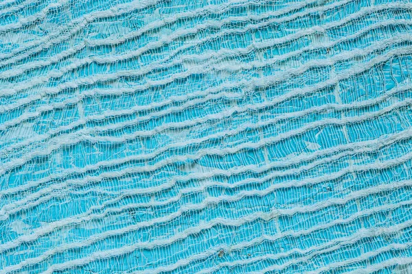 Fondo azul claro con gasa tenue en la superficie — Foto de Stock