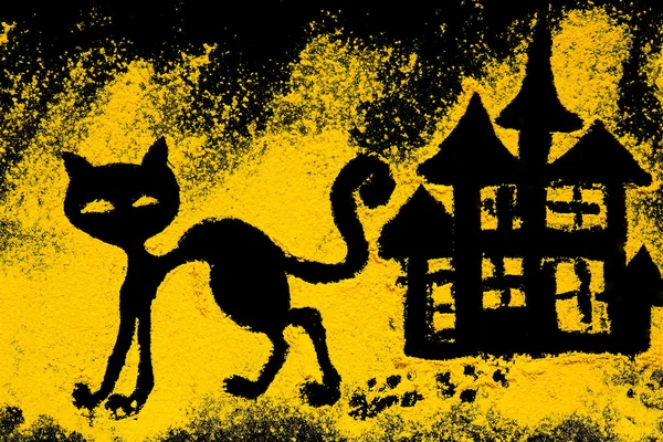 Symbol Halloween black cat is decorated with turmeric — Zdjęcie stockowe