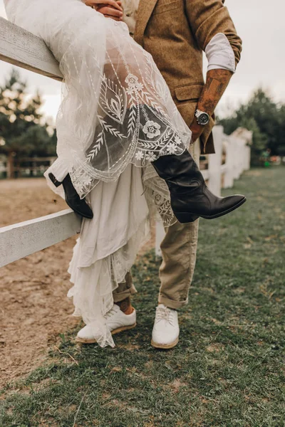 Beautiful wedding couple.  Bohemian wedding  at the ranch. Magic sunset