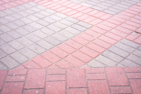 Gray-pink rectangular paving slabs
