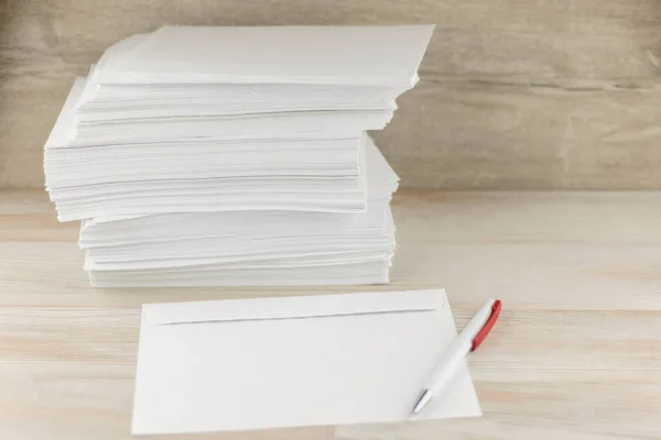Office Work Correspondence Stack Blank Envelopes Wooden Table Envelope Ballpoint — Stock Photo, Image
