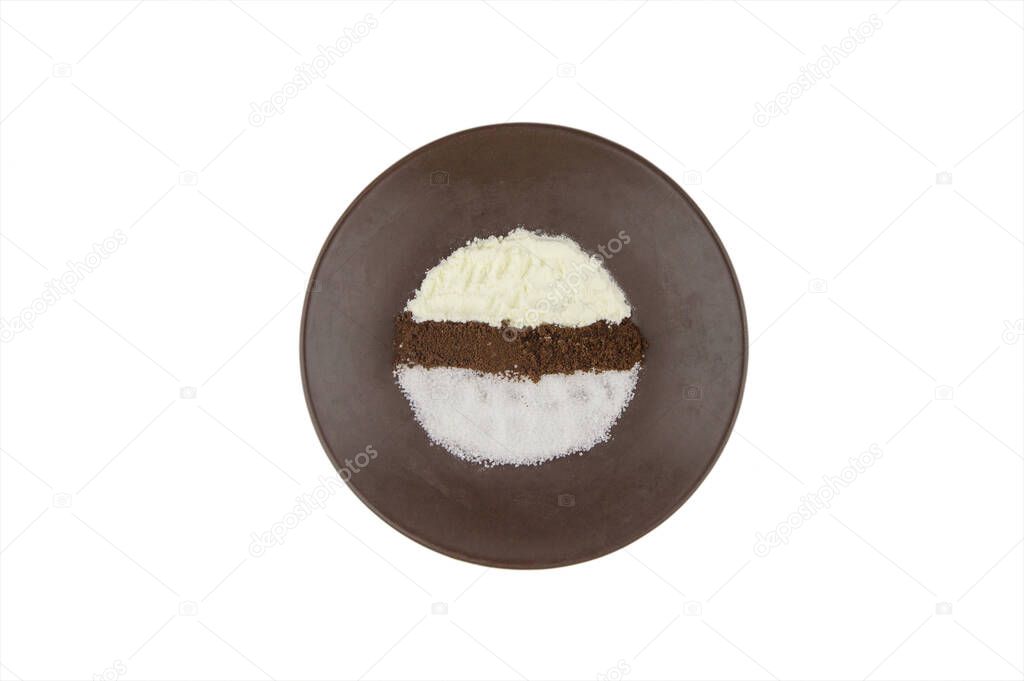 morning cheerfulness charge: ground coffee, dry skim cream and granulated sugar prepared on a brown plate for brewing a delicious drink, 3 in 1, isolated on white