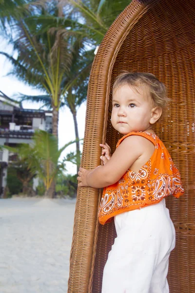 Cute baby child girl on tropical bacground — Stock Photo, Image