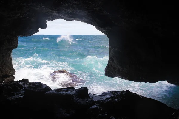 Sea view through cove in rocks — Stock Photo, Image