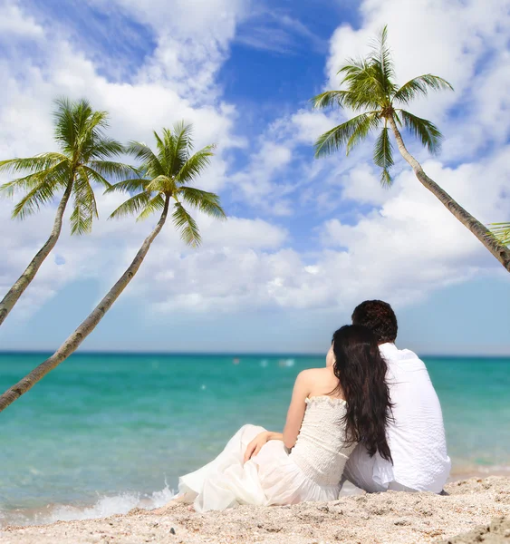Young loving couple on tropical sea background Stock Photo