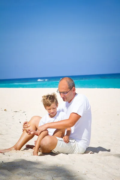 Father and son on beach Royalty Free Stock Photos
