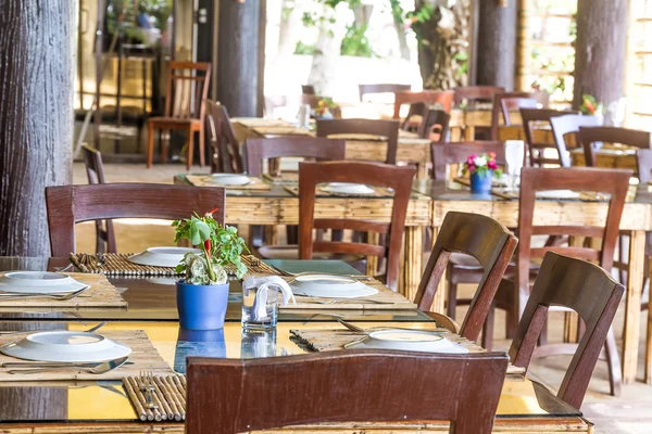 Table setup in outdoor cafe, small restaurant in a hotel, summer — Stock Photo, Image