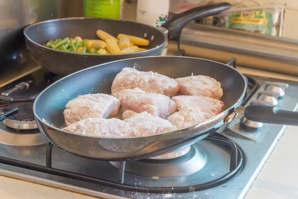 Fish fillet cooking on fry pan, food preparation, cooking time — Stock Photo, Image