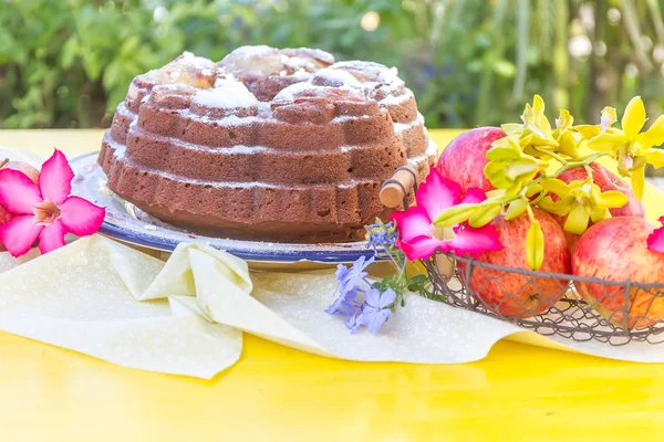 Freshly baked home-made banana apple cake on natural background — Stock Photo, Image