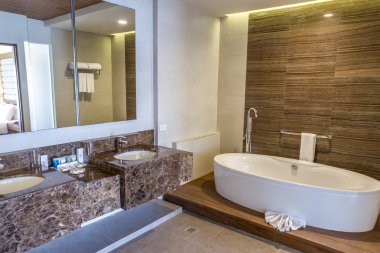 spacious bathroom in a house or hotel clipart