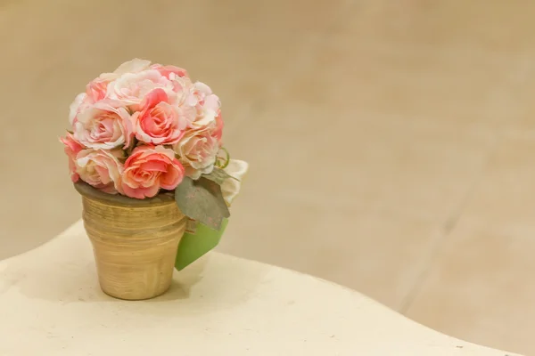 Artificial fake flower bouquet on blurred background — Stock Photo, Image