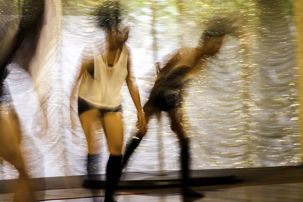 Dancing people in motion — Stock Photo, Image