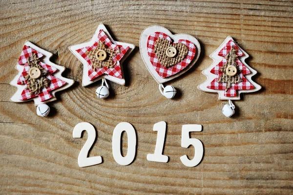 Natale e Capodanno 2015 decorazione su sfondo di legno — Foto Stock