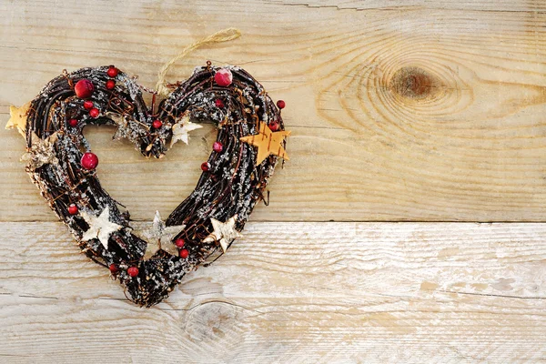 Cuore a forma di Natale decorazione legno sfondo — Foto Stock