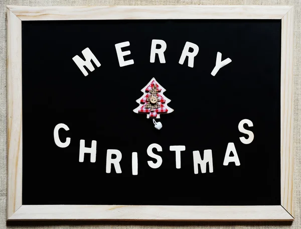 Merry christmas tree op blackboard — Stockfoto