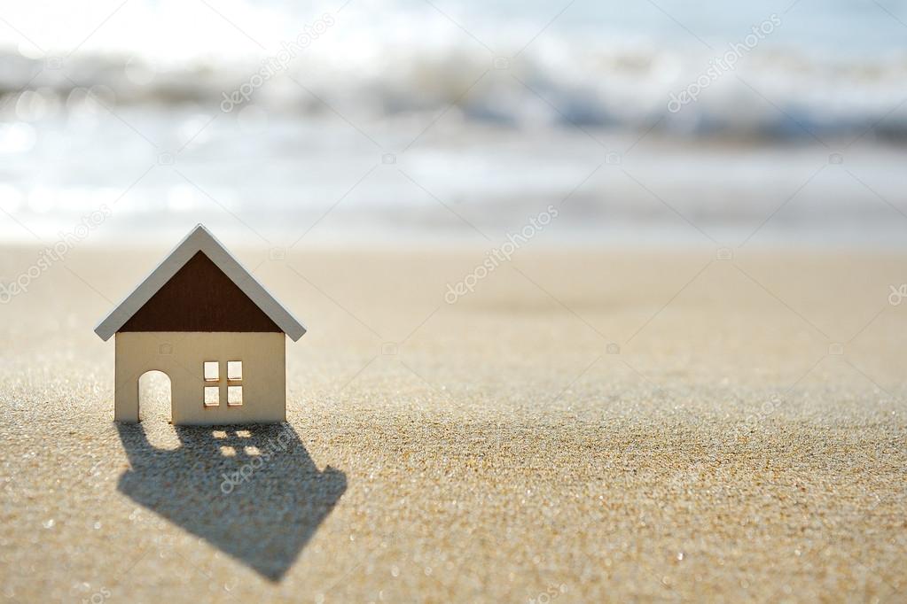 house on the sand beach near sea