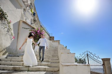 beautiful couple bride and groom in a sunny day in Italy