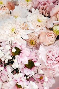Soft pink and white floral arrangement with babys breath and delicate textures used in symbolic visual storytelling. Florals in emotional branding, sentimental design, poetic product styling. High
