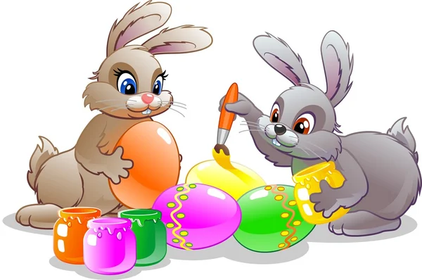 Пасхальные кролики красят яйца — стоковый вектор