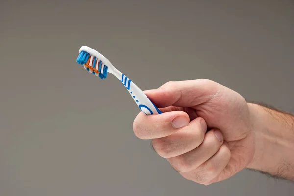 Caucasian Male Hand Holding Used Toothbrush Isolated Gray Background — Stock Photo, Image