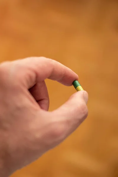 Caucasian Male Hand Holding Medical Pill His Fingers Shallow Depth — Stock Photo, Image