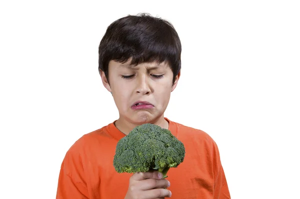 Ragazzo che detiene broccoli — Foto Stock