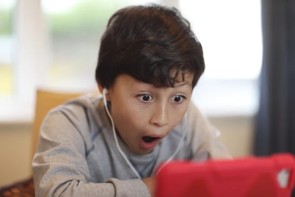 Boy with computer tablet — Stock Photo, Image