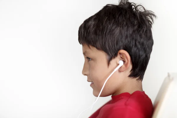 Perfil de niño con auriculares — Foto de Stock