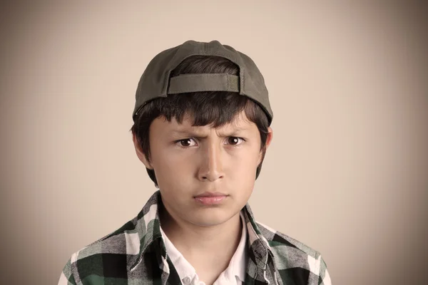 Portrait of serious young boy with vintage look and vignetting — Stock Photo, Image