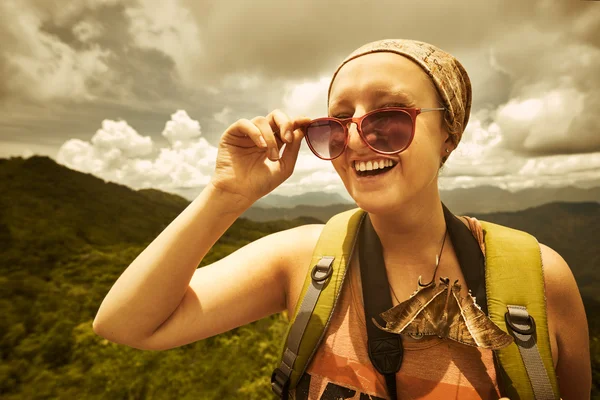 The portrait of a young laughing girl with the big butterfly on — Stock Photo, Image