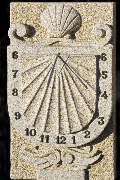 Artistic sundial on granite stone Stock Photo