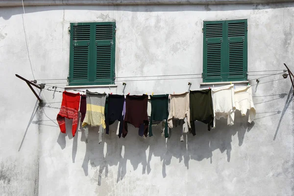 Drying clothes on the wall — Stock Photo, Image