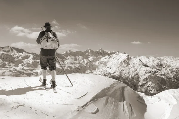 Sepia Vintage skier with wooden skis — Stock Photo, Image