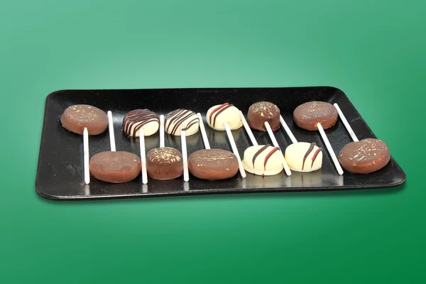 Schokoladenbonbons auf einem Stock — Stockfoto