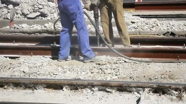 Two Workers with pneumatic hammer — Stock Video