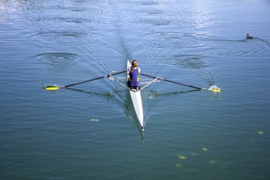 Young girl rower clipart