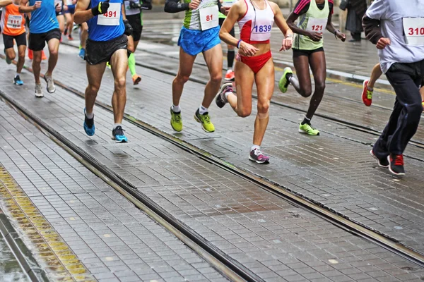 Corredores de maratón, movimiento borroso — Foto de Stock