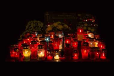 Candles Burning At a Cemetery clipart