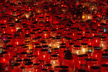 Candles Burning At a Cemetery clipart