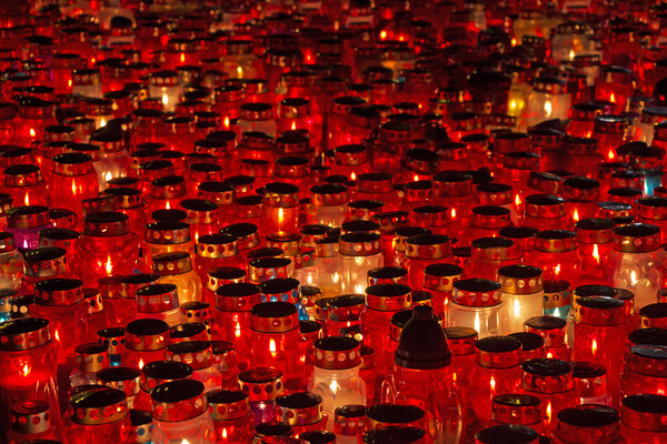 Candles Burning At a Cemetery