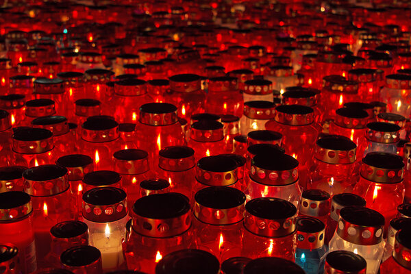 Candles Burning At a Cemetery