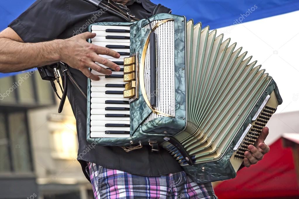 Young accordionist playing
