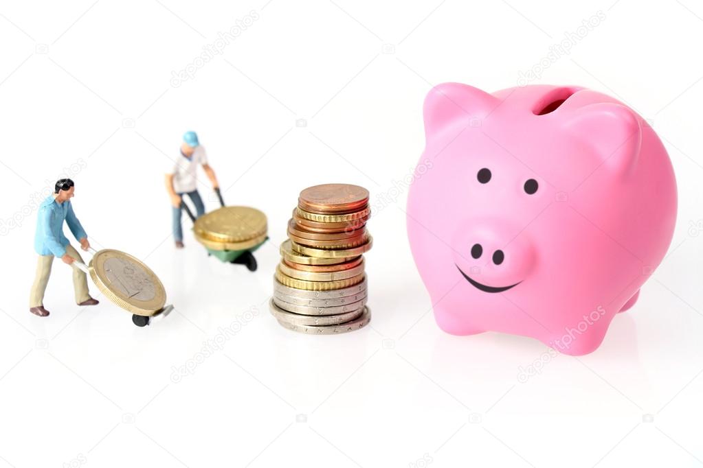Euro coins and piggy bank