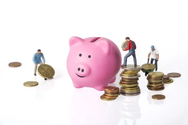 Piggy bank en euromunten — Stockfoto