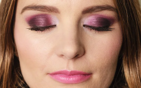 Woman closed eyes with violet dark shadows makeup — Stock Photo, Image