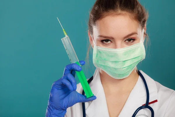 Doctor holding  syringe with needle. — Stock Photo, Image