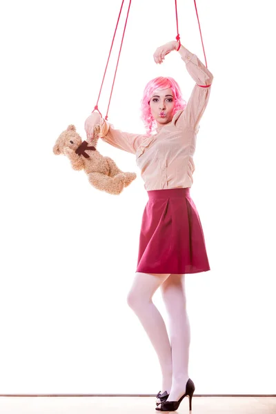 Woman girl stylized like marionette puppet on string — Stock Photo, Image